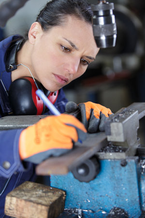 woman marks a metal materialの写真素材