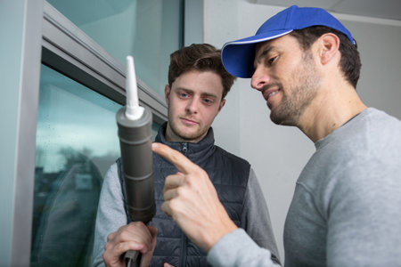 plow learning how to use a silicone gunの写真素材