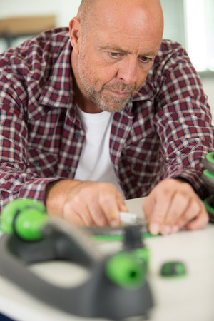 an industrial worker fixing pipesの写真素材