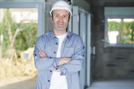 happy man worker on the construction siteの写真素材