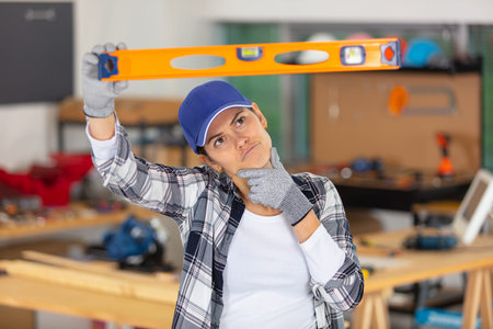 attractive middle aged professional female carpentry worker
