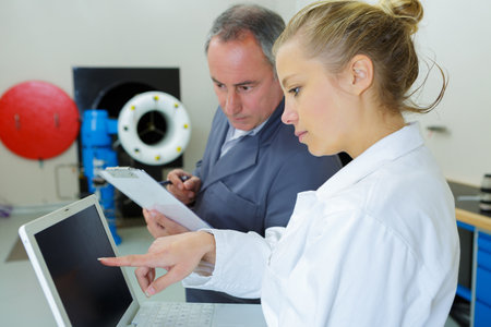 an engineering job and laptopの写真素材