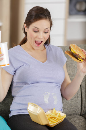 unhealthy eating in pregnancy conceptの写真素材