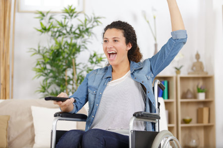 a happy woman in wheelchair
