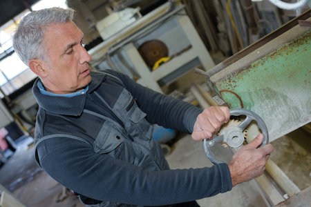 portrait of senior worker in workshop