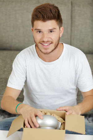 happy man planning to move housesの写真素材