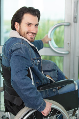 disabled happy man in wheelchairの写真素材