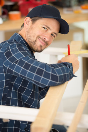 a young carpenter in carpentryの写真素材