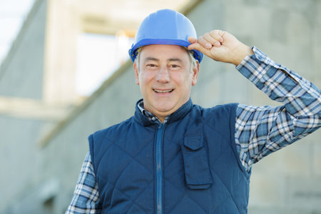 portrait of mature smiling man in uniformの写真素材