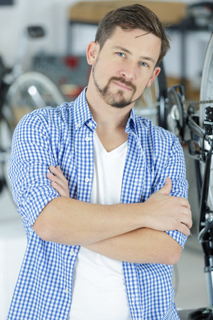 bike mechanic repairing a bikeの写真素材