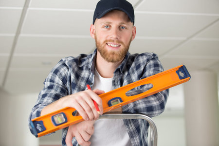handyman contractor smiling at the camera