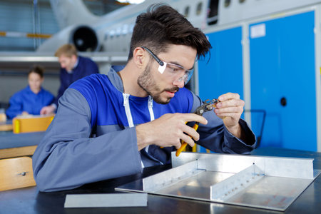 young male aviation engineer in training