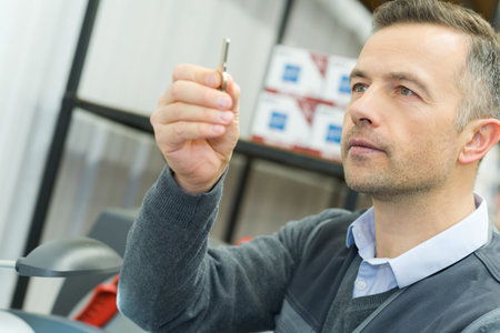 happy sales manager holding a key
