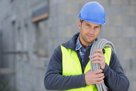 smiling builder outdoors