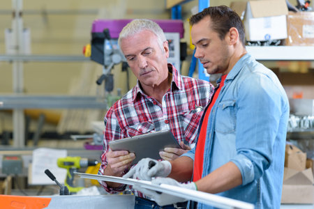 businessmen with clipboard at warehouse