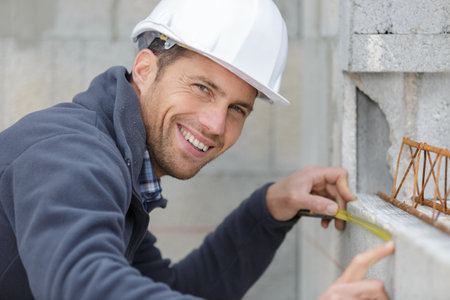 man working on concrete structureの写真素材