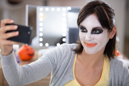 girl in makeup and costume fro halloweenの写真素材