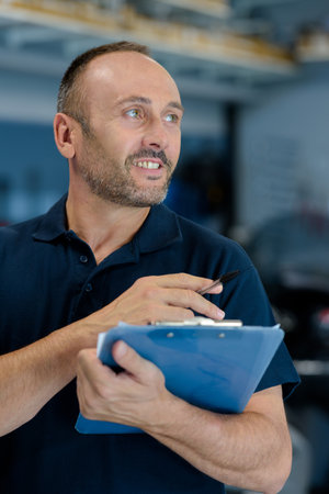 a man with a clipboardの写真素材
