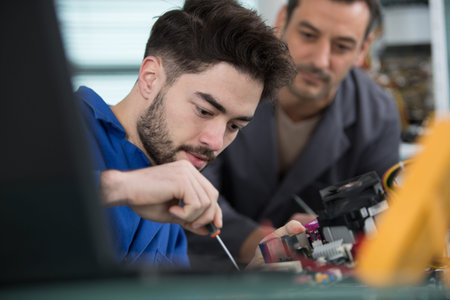 happy smiling man working as handymanの写真素材