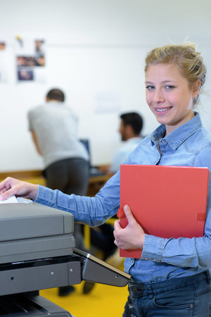 smiling student making a copy