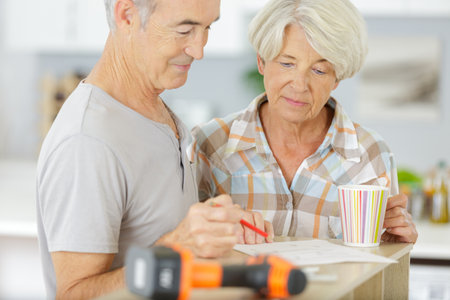 elderly couple with renovation planの写真素材