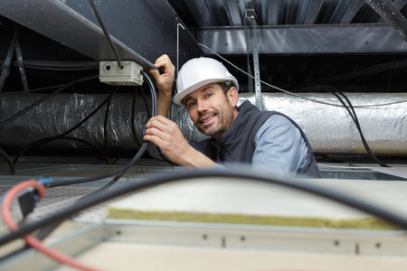 man working on the roofの写真素材