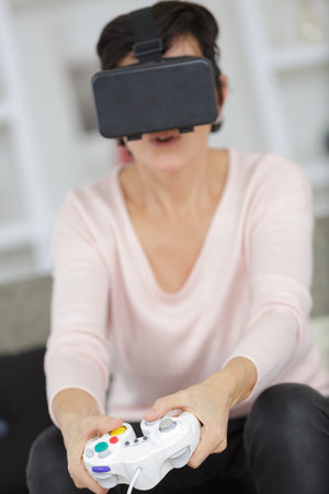 woman playing virtual reality games