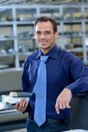 warehouse manager looking at cameraの写真素材