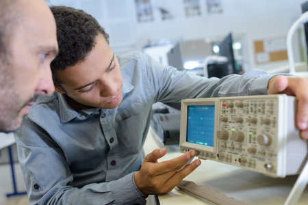 industrial technician checking a malfunctioned gadget