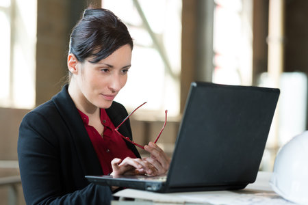 portrait of businesswoman with laptop