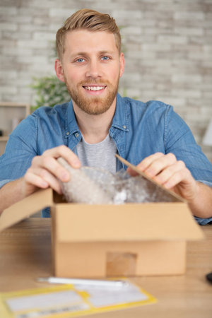 seller prepares the delivery box for the customer