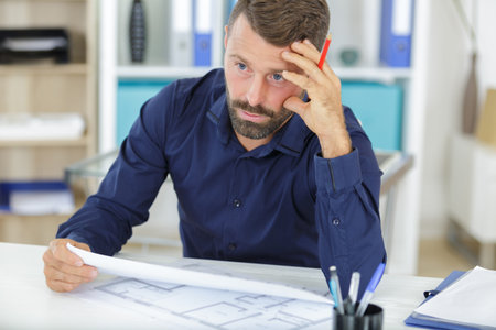 mature handsome pensive male entrepreneur