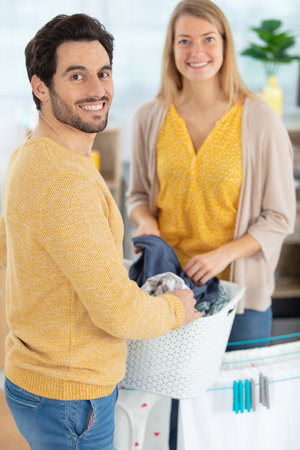 concept of togetherness in houseworkの写真素材