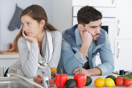 couple having an argument in the kitchenの写真素材