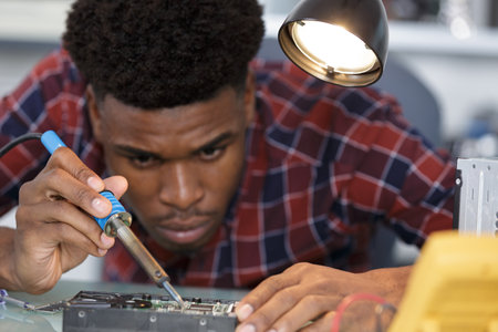 repairman working in technical support fixing computer laptop trの写真素材