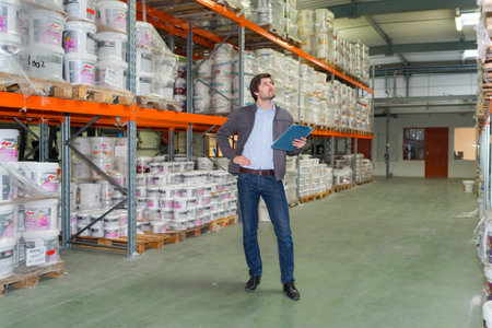 portrait of manager in warehouseの写真素材
