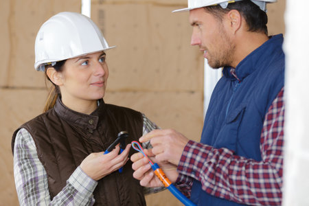 apprentice construction worker with mentorの写真素材