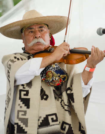 PUEBLA, PUEBLA, MEXICO - OCTOBER 2, 2016: Violinist performing at the stage in Puebla, Puebla, Mexicoのeditorial素材