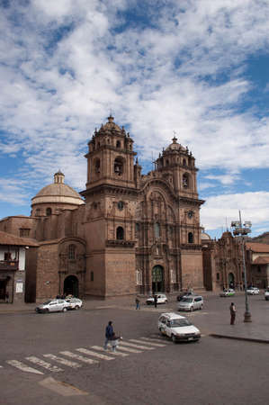 CUSCO, PERU- AUGUST 23, 2010: View of a cathedral in Cusco, Peru with a cloudy skyのeditorial素材