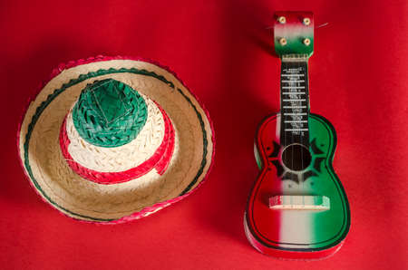 Hat and toy guitar. Accessories for mexican Independence Day celebrationの写真素材