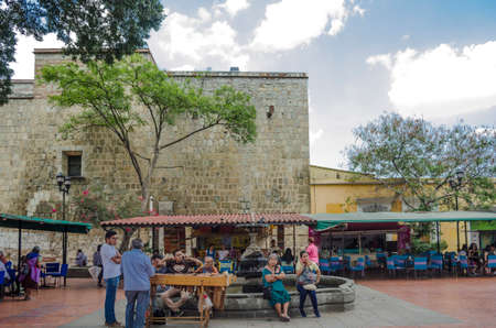 OAXACA, OAXACA, MEXICO- JUNE 1 , 2018: People relaxing at terrace of Basilica de la Soledad at a sunny day in Oaxaca, Mexico.のeditorial素材