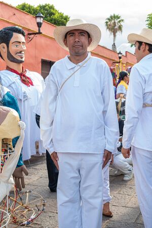 OAXACA, OAXACA, MEXICO- JULY 6, 2019: Man dressed with traditional clothes during the Convite, a party made for invite to a big traditional party called Guelaguetza in Oaxaca, Mexicoのeditorial素材
