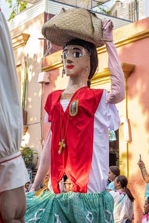 OAXACA, OAXACA, MEXICO- JULY 6, 2019: Giant puppet dressed as china oaxaqueÃ±a during the Convite, a party made for invite to a big traditional party called Guelaguetza in Oaxaca, Mexicoのeditorial素材