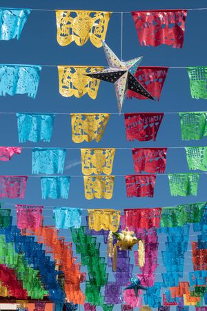 Colorful cut paper decoration at the street in Oaxaca, Mexicoの写真素材