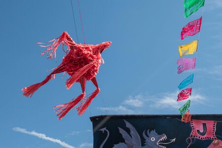 Colorful mexican pinata decoration at the street in Oaxaca de Juarez, Mexicoの写真素材