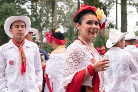 XALAPA, VERACRUZ, MEXICO- NOVEMBER 24, 2019: Young woman posing with traditional clothes during the Record La Bamba 2019 in Xalapa, Veracruz, Mexicoのeditorial素材