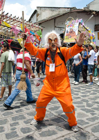 XICO, VERACRUZ, MEXICO- JULY 20, 2013: Portrait of a man with a costume during the festivities of Santa Maria Magdalena in Xico, Veracruz, Mexicoのeditorial素材