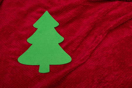 Christmas tree, ornament for Christmas celebration on red backgroundの写真素材