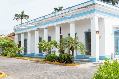 TLACOTALPAN, VERACRUZ, MEXICO- AUGUST 21, 2021: Street with typical colorful houses of mexican colonial town Tlacotalpan UNESCO World Heritage Siteのeditorial素材