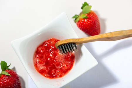 Strawberry for teeth cleaning. DIY homemade personal hygiene products.の写真素材